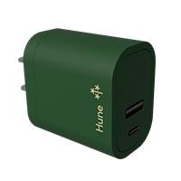 a green piece of luggage sitting on top of a table a green piece of luggage sitting on top of a table